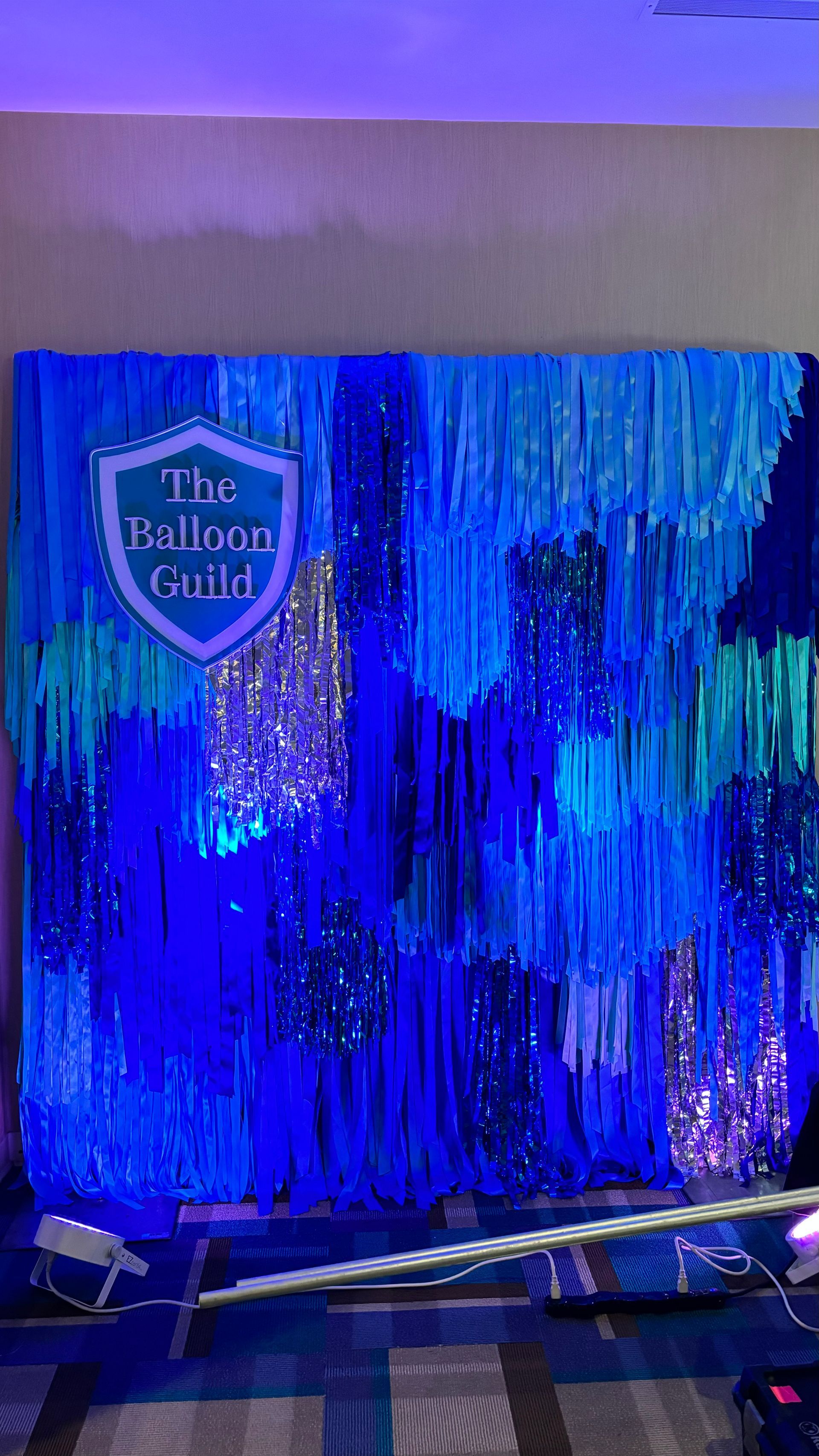 Blue and turquoise streamers backdrop with 