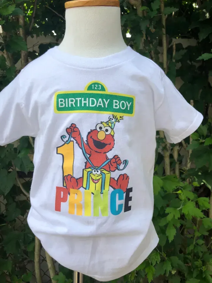 White t-shirt with Sesame Street's Elmo and