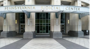 Pennsylvania Judicial Center entrance with columns, glass doors.