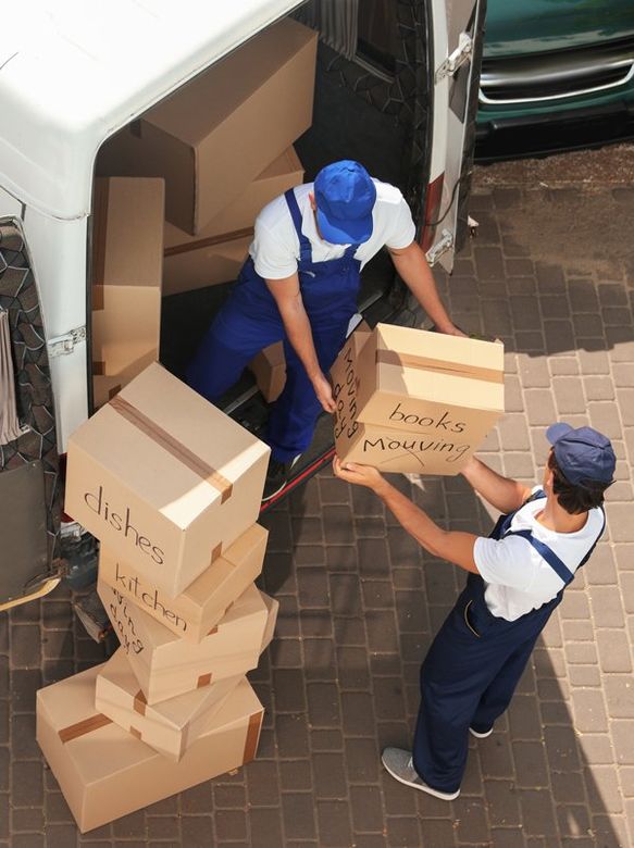 Professional Movers Unloading Boxes