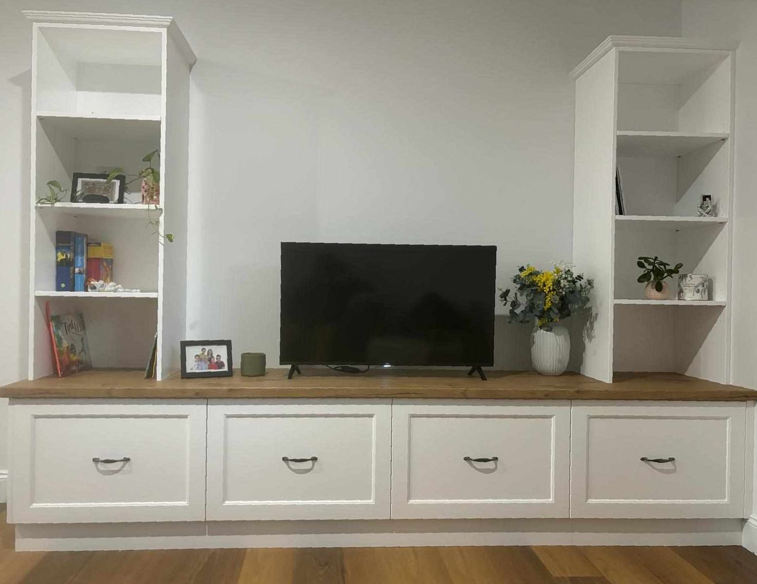 A Large entertainment unit with TV on stand — Crispin Cabinetmakers in Woolgoolga, NSW