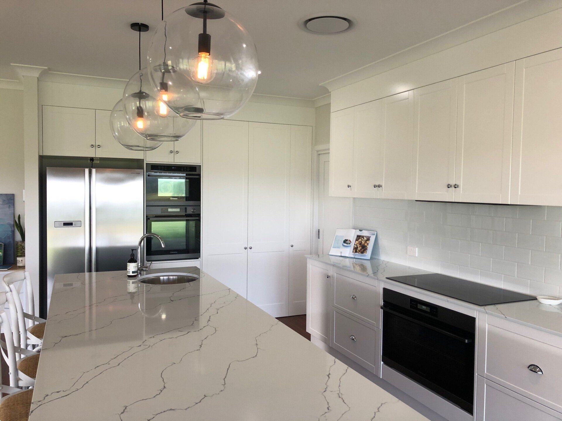 Marble Benchtop and White Kitchen — Crispin Cabinetmakers in South Grafton, NSW