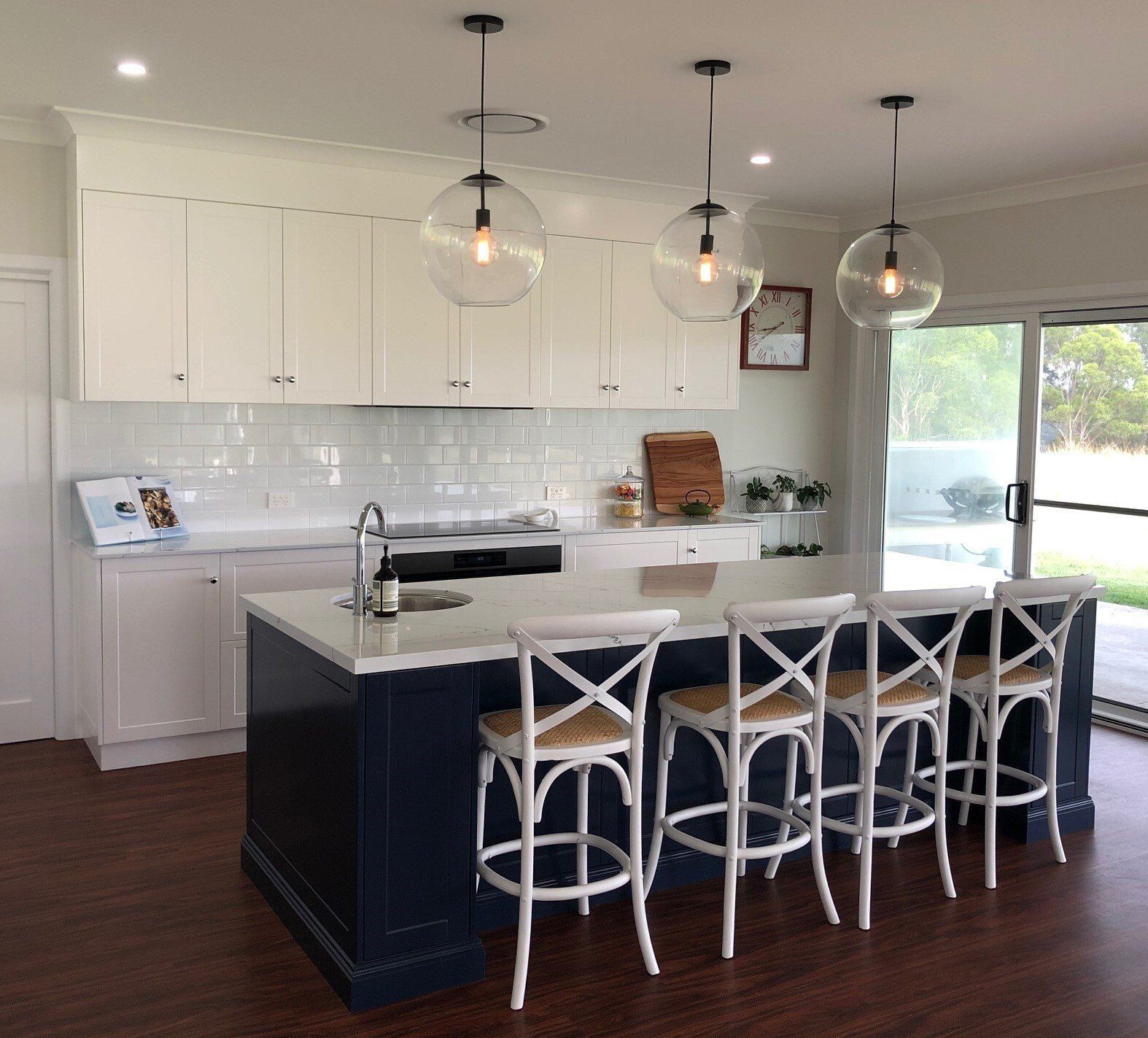White Kitchen with Navy Island Benchtop — Crispin Cabinetmakers in South Grafton, NSW