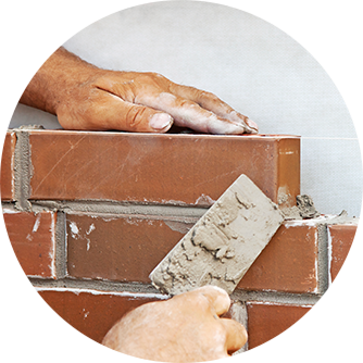 Masonry Fixing — Man Laying Bricks on A New House in Albany, CA