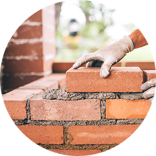 Quality Masonry — Construction Worker Laying Bricks in Albany, CA