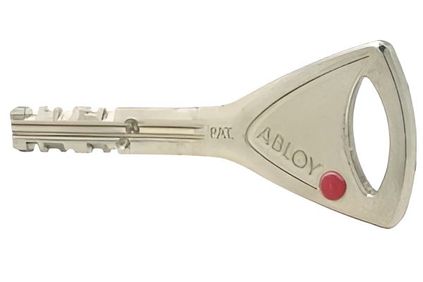 A Close Up of an Abloy Key on a White Background — Darwin Lock & Key In Coconut Grove, NT