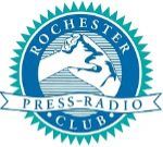 The logo for the rochester press radio club shows a hand holding a microphone.