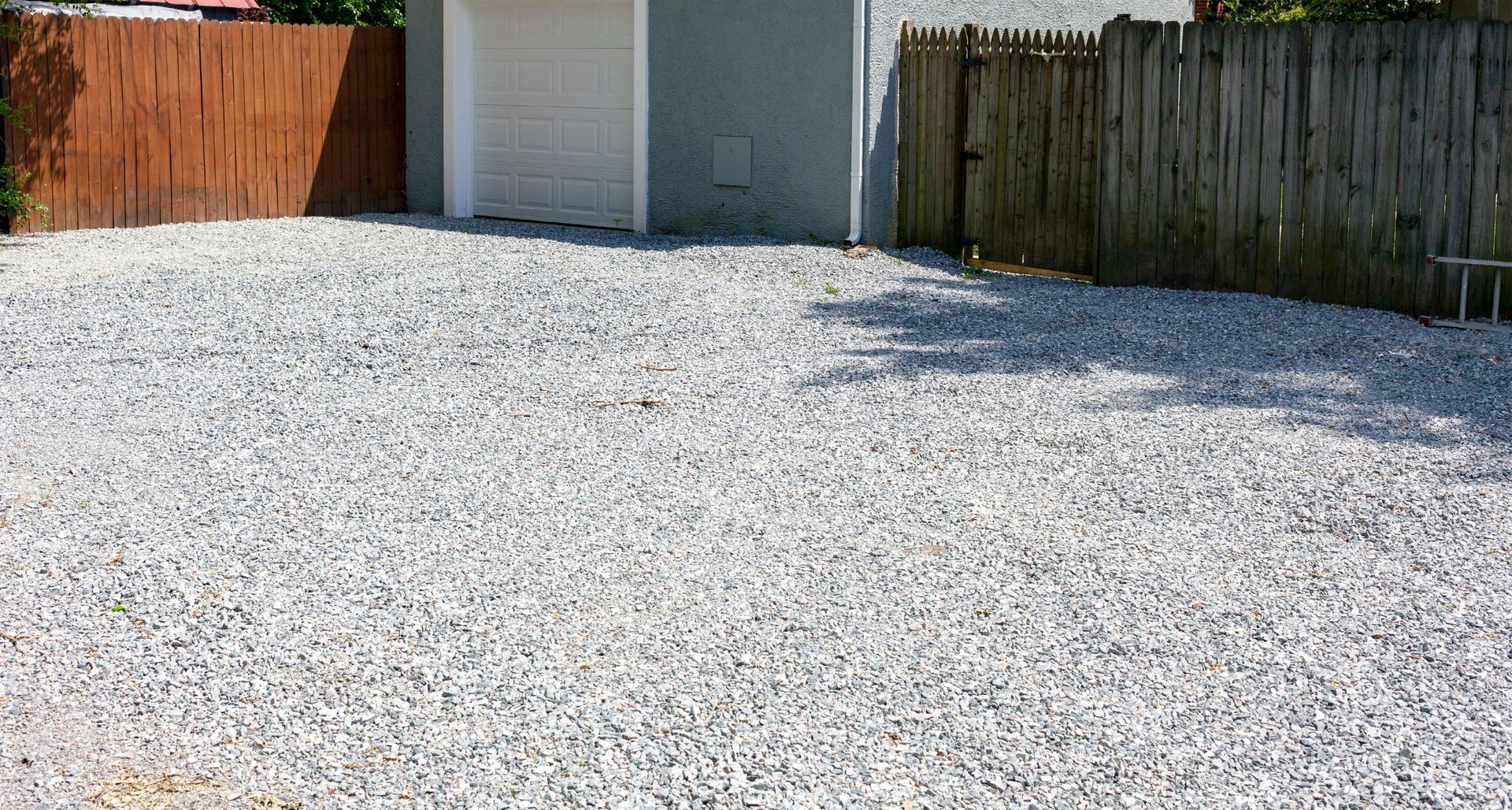 Gravel driveway on residential property Gravel driveway on residential property