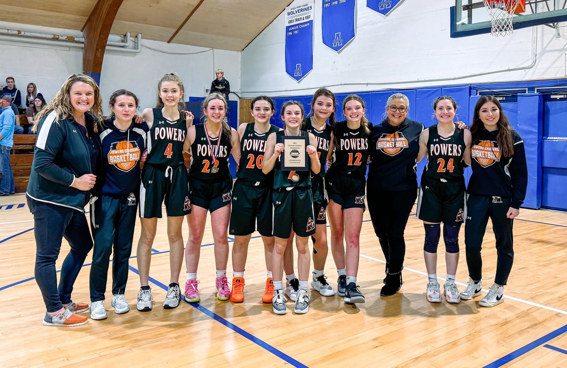 a group of children posing for a picture with one boy wearing a shirt that says youngies
