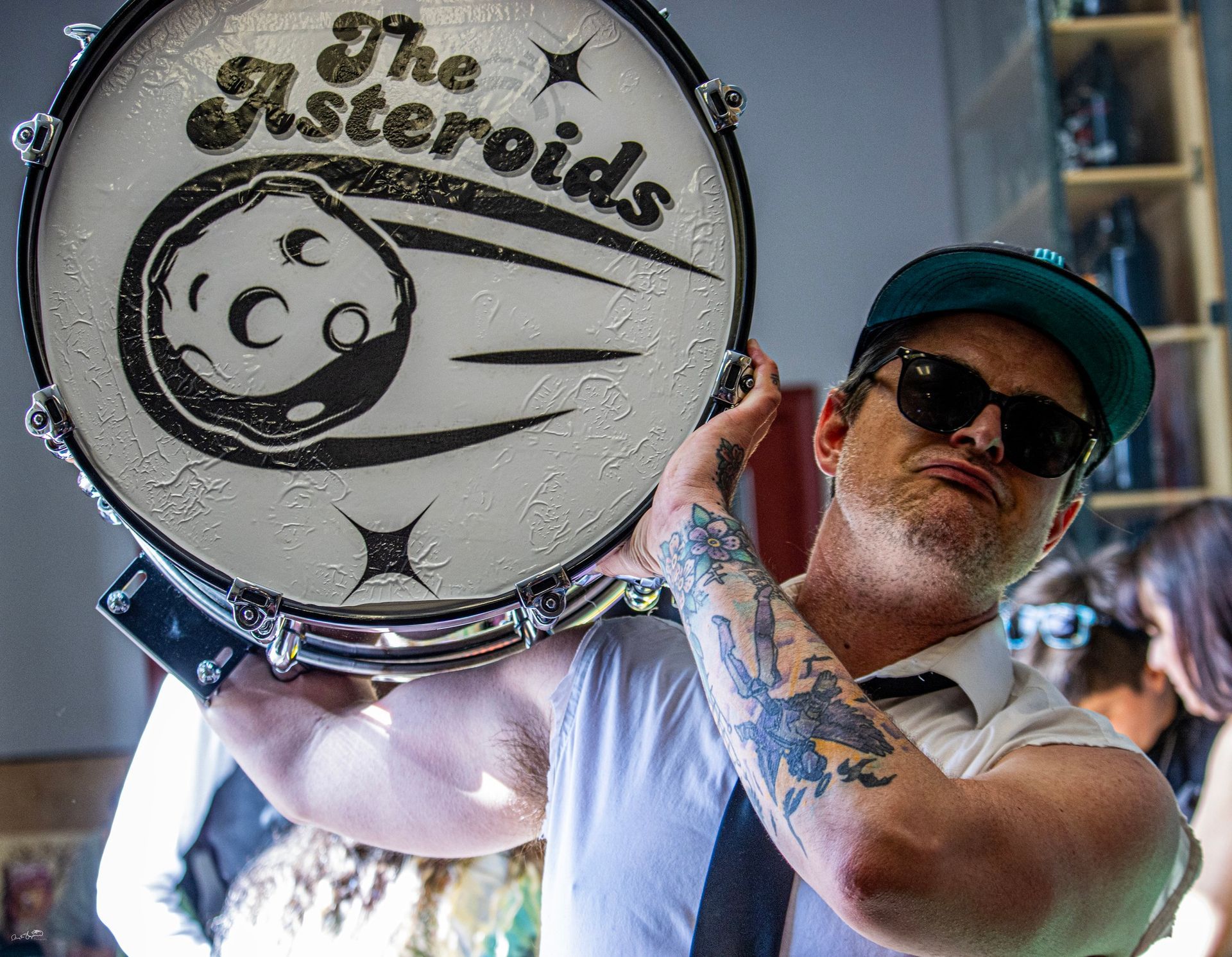 Man holding a drum with 