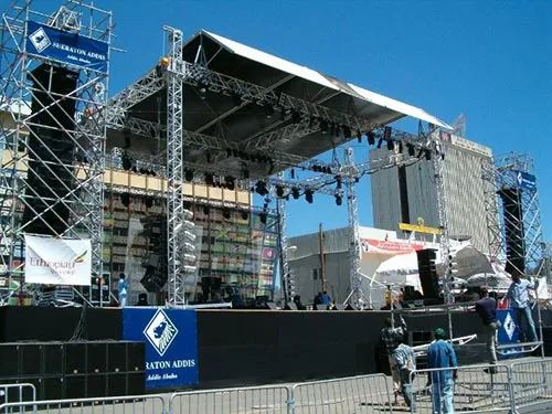 A large stage with a sign that says ' lions ' on it
