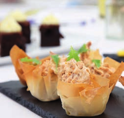 A close up of a tray of food on a table.