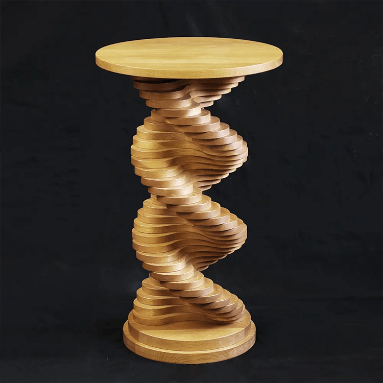 A wooden table with a spiral design on it