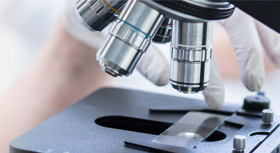 microscope being used to exam sample