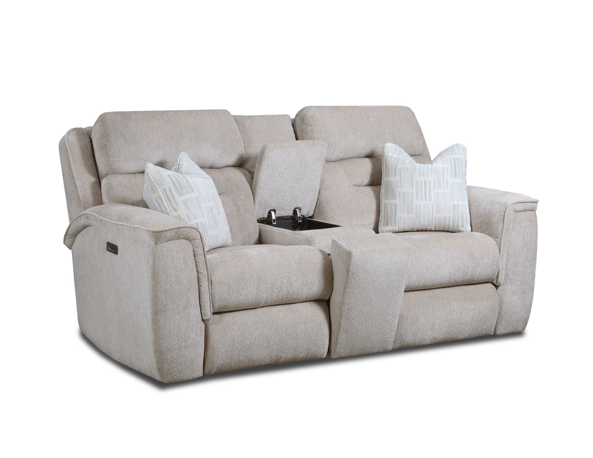 A cream-colored, two-seat reclining loveseat with a center console, cup holders, and two patterned accent pillows.