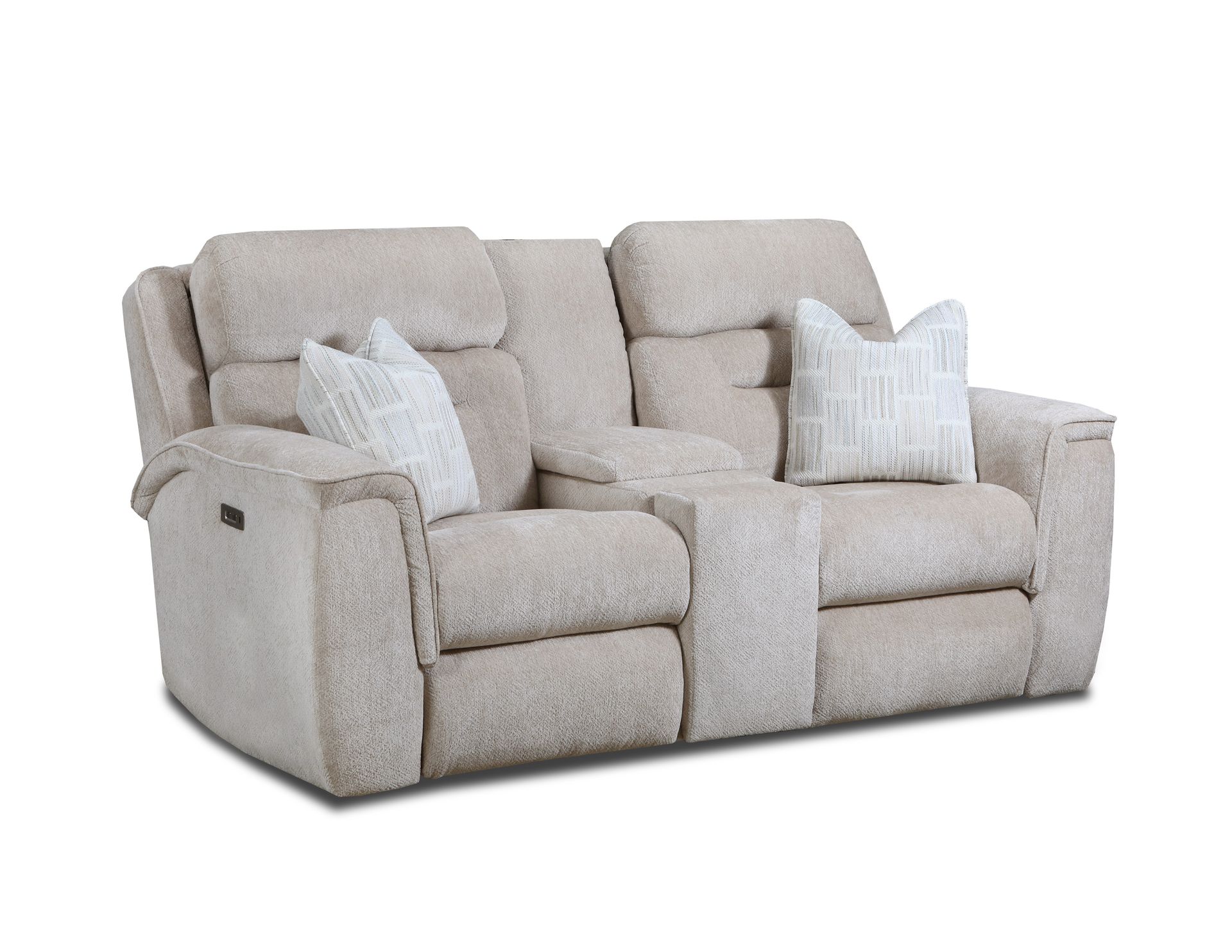 A beige, textured loveseat recliner featuring a center storage console and two patterned throw pillows.