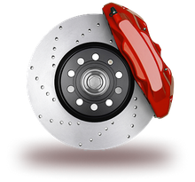 A red high-performance brake caliper mounted over a silver, cross-drilled vehicle brake disc. | Integrated Automotive