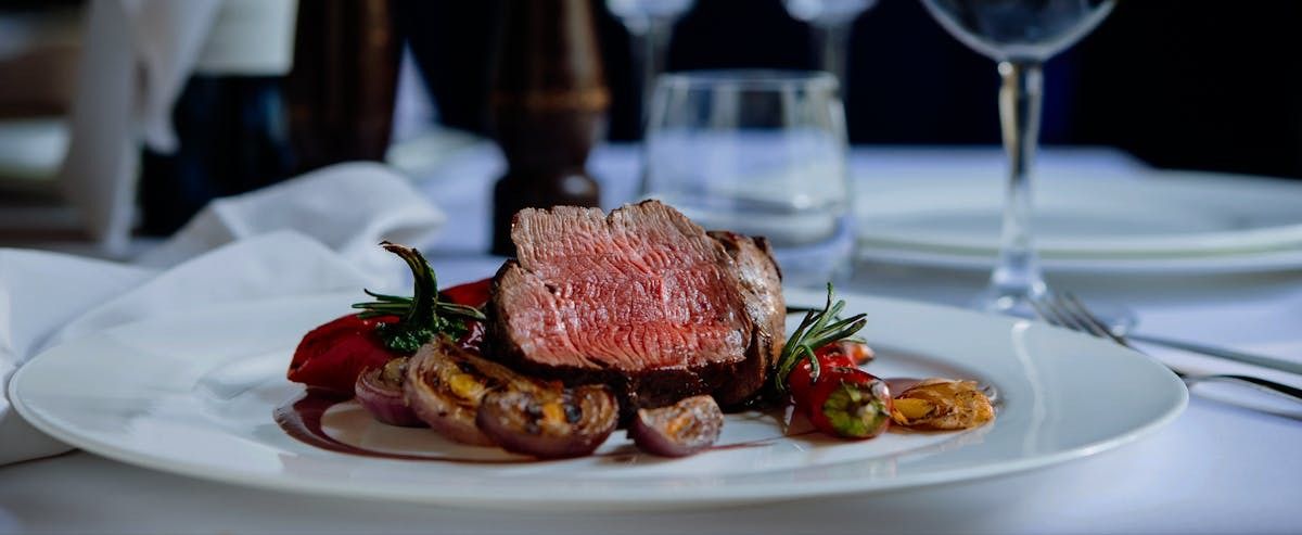 Meat And Vegetables On A Table — Brookeville, MD — The Manor at Silo Falls
