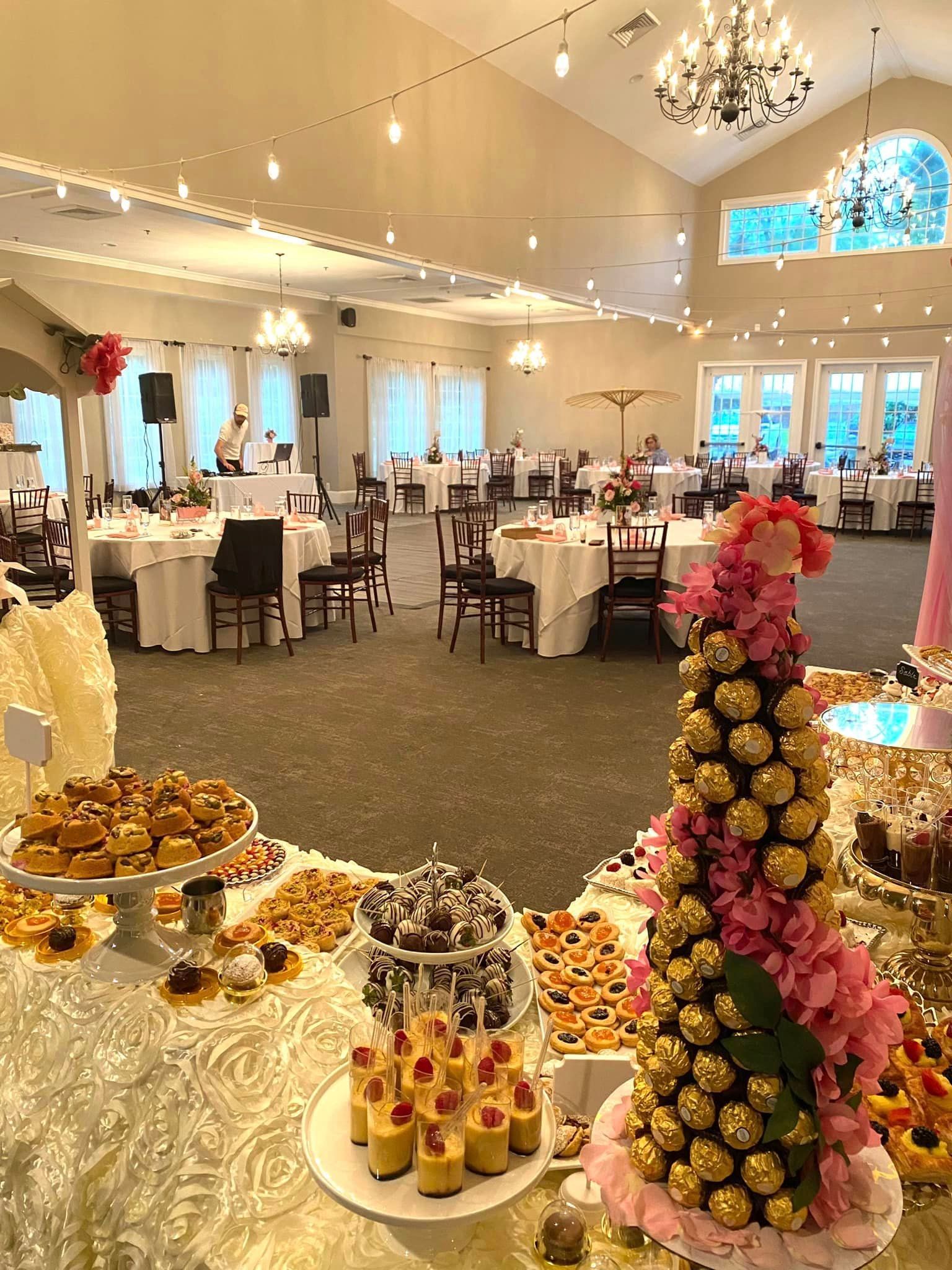 A large room with tables and chairs filled with food and desserts. | Brookeville, MD | Silo Falls
