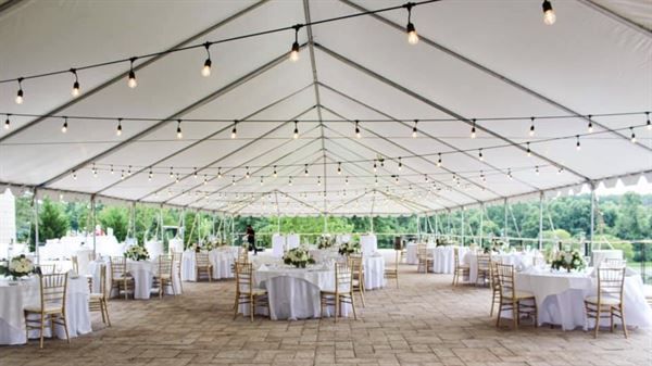 A large tent with tables and chairs underneath it | Brookeville, MD | Silo Falls