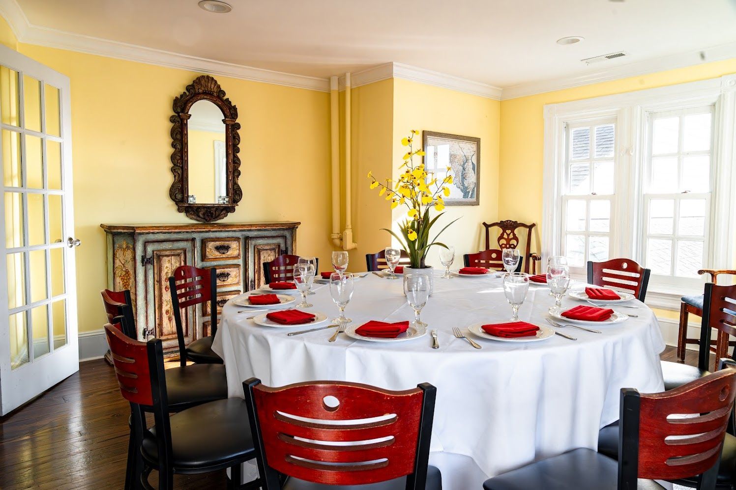 A dining room with a round table and chairs. | Brookeville, MD | Silo Falls
