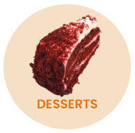 Slice of red velvet cake, white frosting,