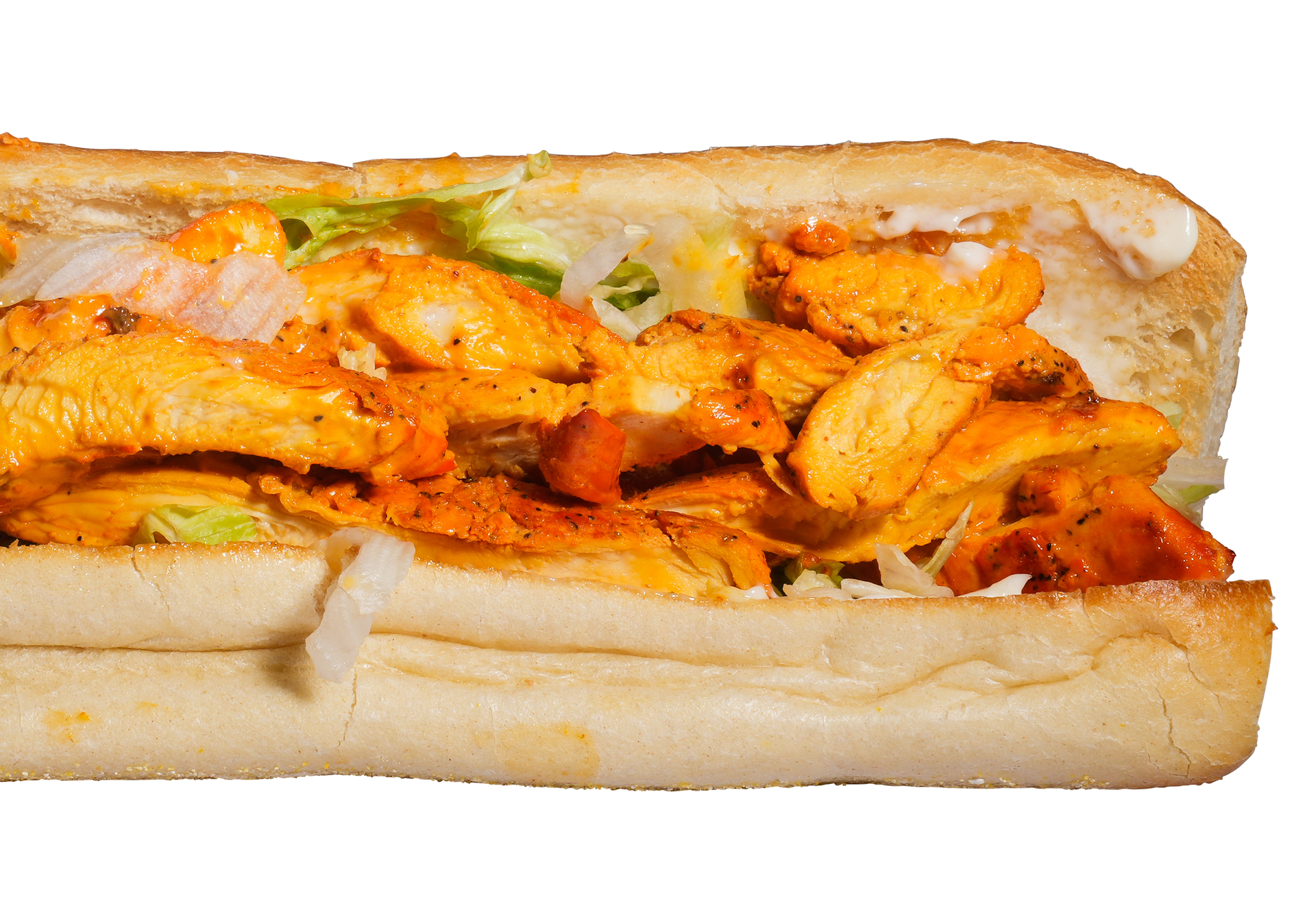 Chicken sandwich with orange-colored chicken and shredded lettuce in a white roll.