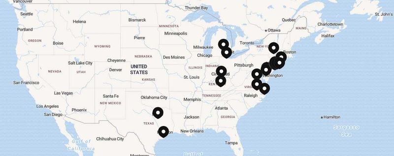 Map of New York City and Long Island with black location markers.