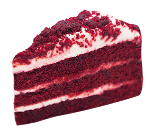 Slice of red velvet cake with cream cheese frosting, topped with crumbs.
