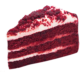 Slice of red velvet cake with white frosting and red crumbles.