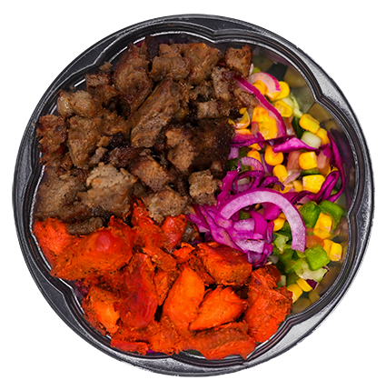 Bowl of food with meat, sweet potatoes, and mixed vegetables.