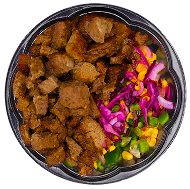 Bowl with cooked meat cubes, corn, red cabbage, and green peppers.