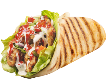 Grilled wrap sandwich filled with chicken, lettuce, tomatoes, and sauces.