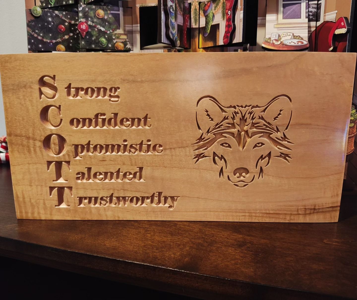 A wooden sign that says strong confident optimistic talented and trustworthy