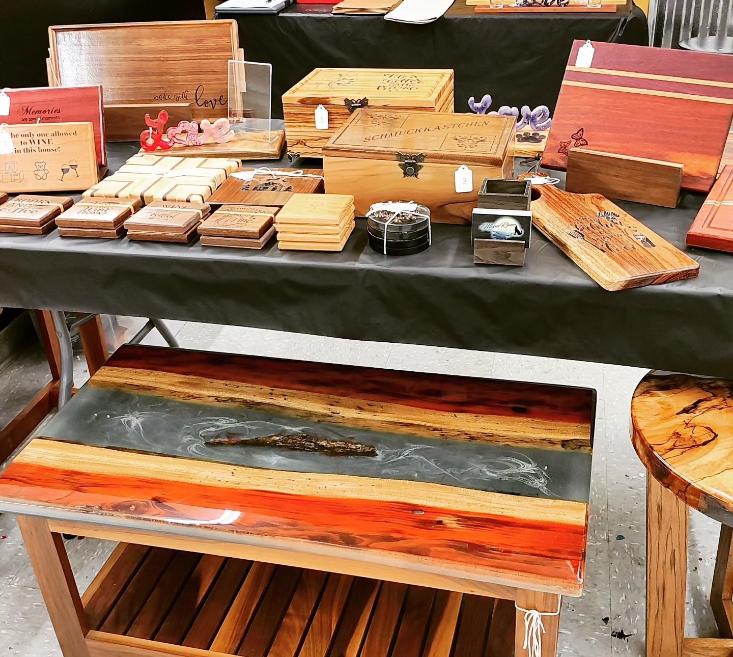 A table with a lot of wooden items on it