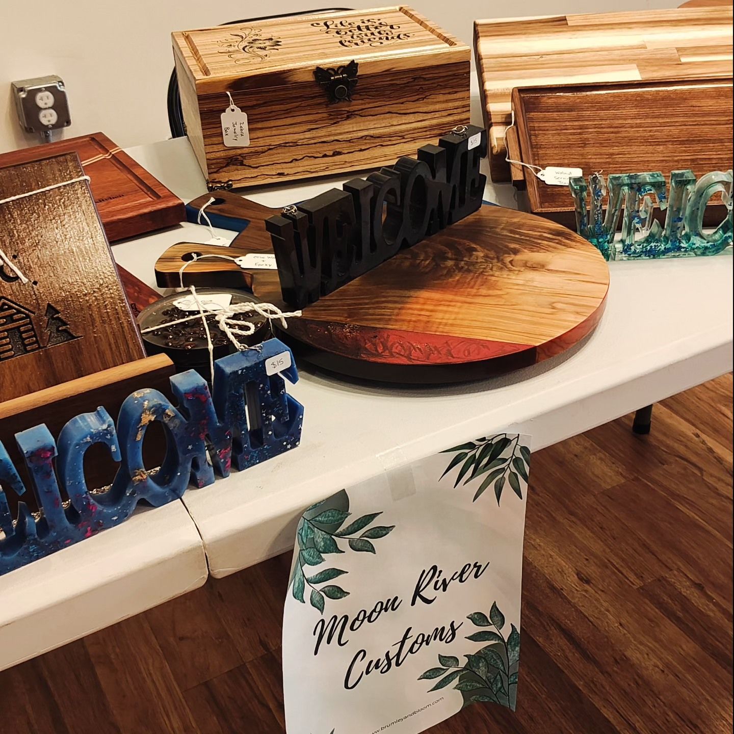 A table with a welcome sign on it