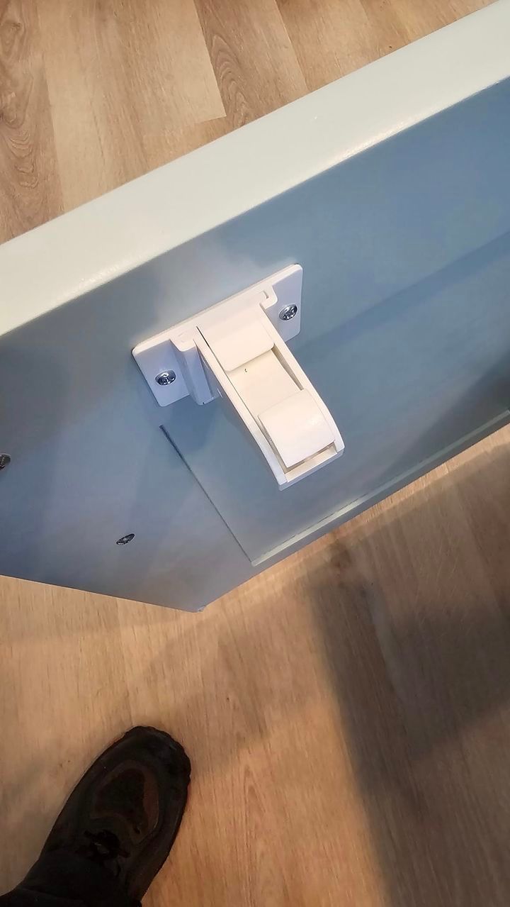 childproof item installed on the cabinet door