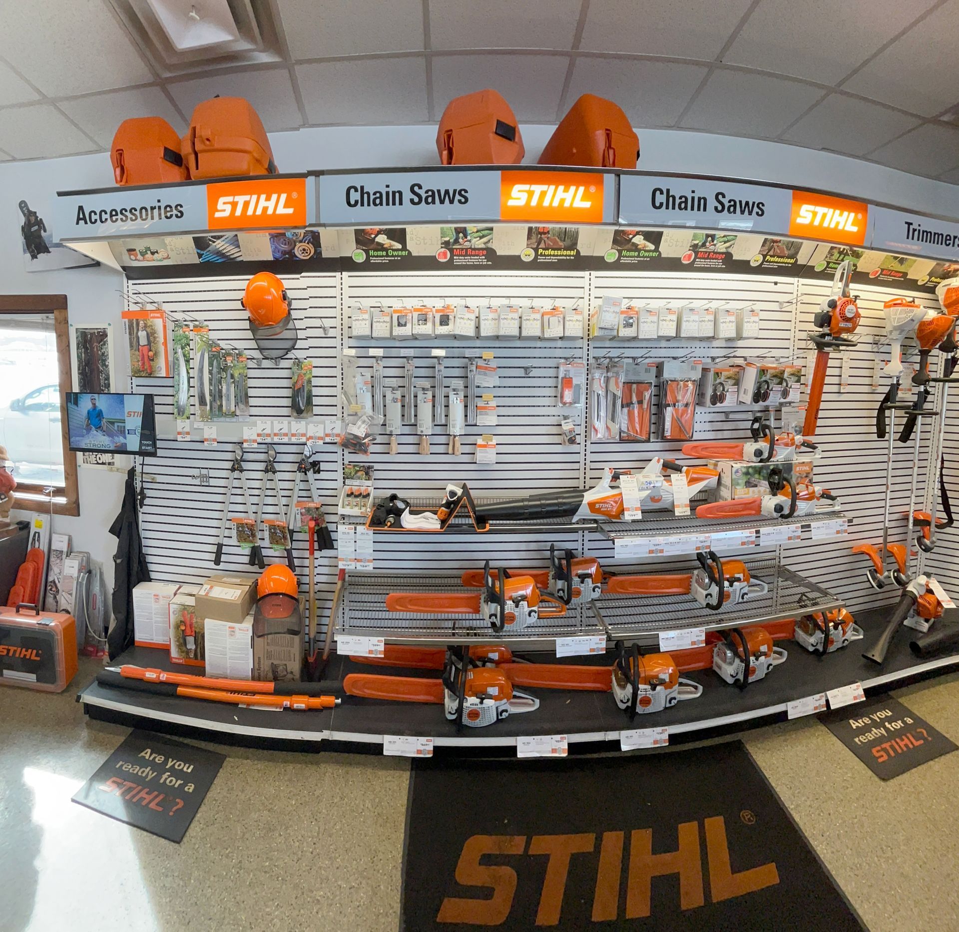 A display of stihl chainsaws in a store