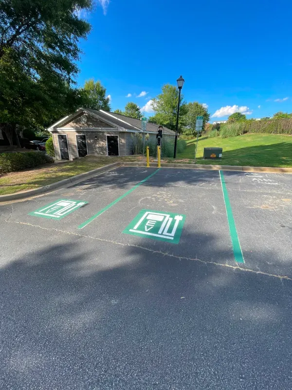 A parking lot with handicap signs painted on it