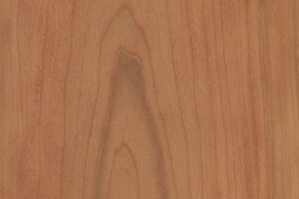 A close up of a piece of wood showing the grain of the wood.