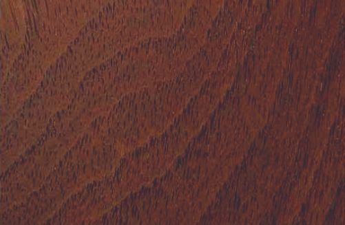 A close up of a piece of wood showing the grain and texture.