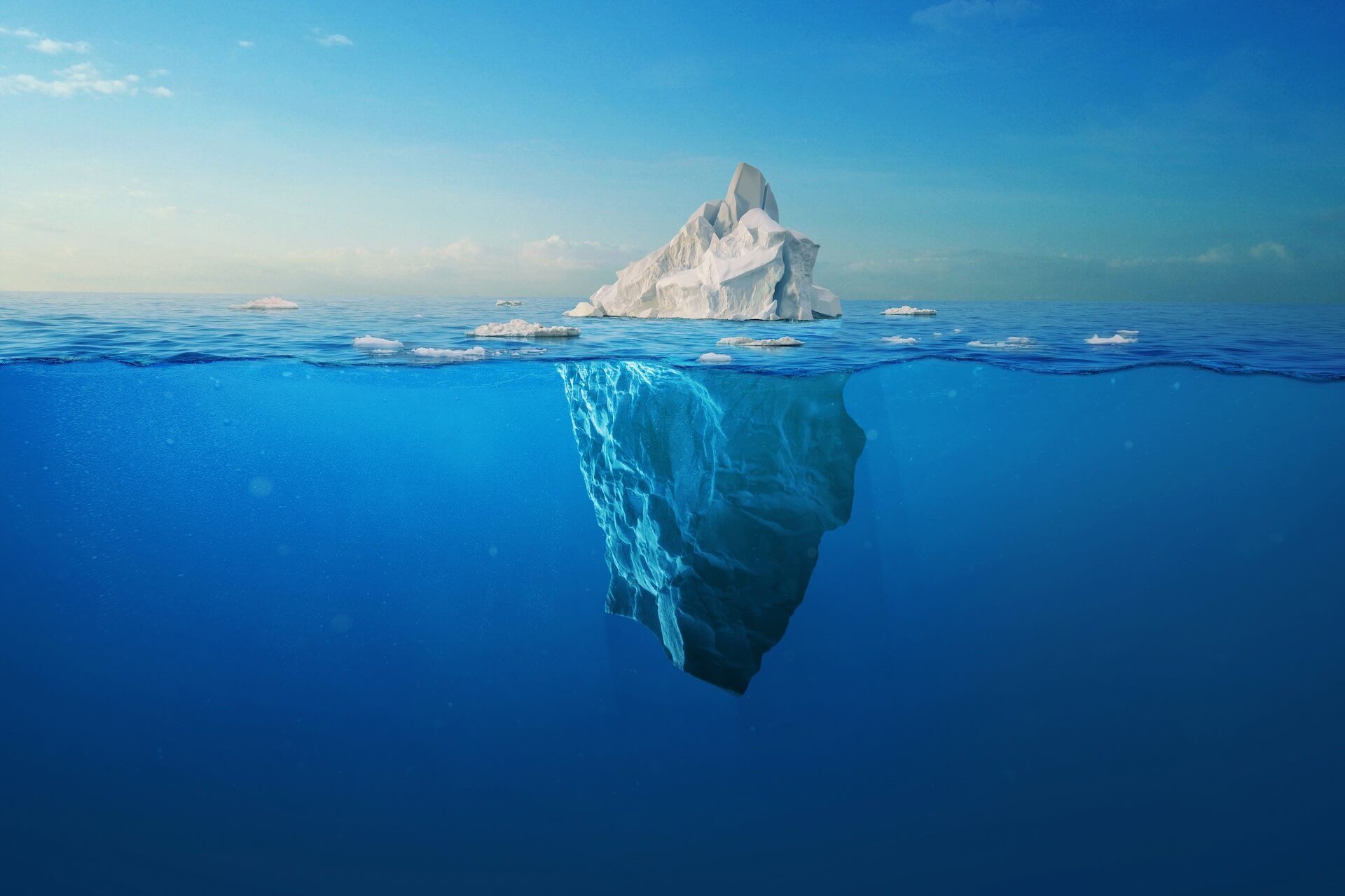 A large iceberg is floating in the middle of the ocean—a Somatic Approach to Jung’s Wisdom.
