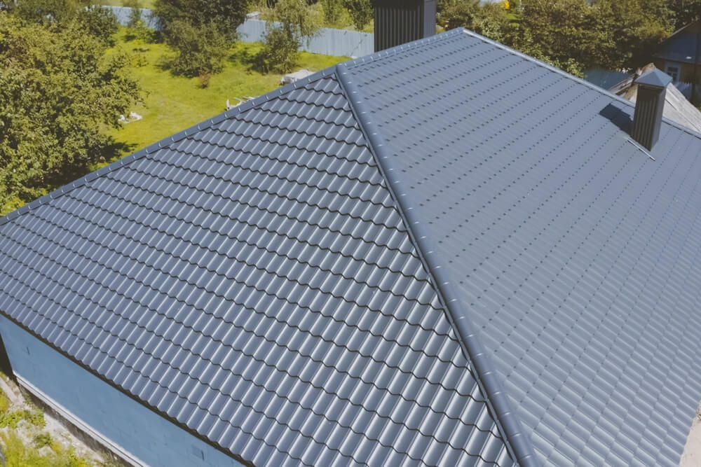 Gray-Blue Metal Roof Tiles — Roof Painting in Hallidays Point, NSW