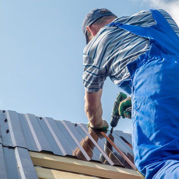 Installing New Metal Sheeting on Roof — Roofing Services in the Manning Valley, NSW