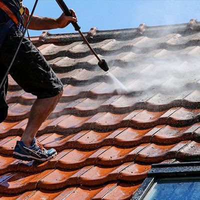 Roof Cleaning With High Pressure Cleaner — Roofing Services in the Manning Valley, NSW