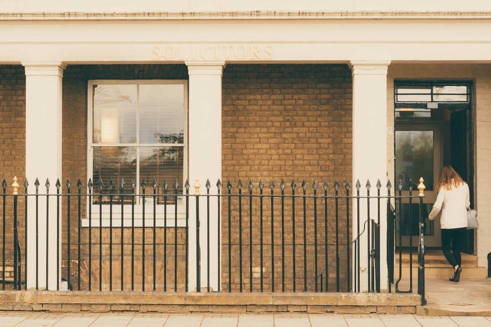 Pink piggy bank with a purple card detailing a
