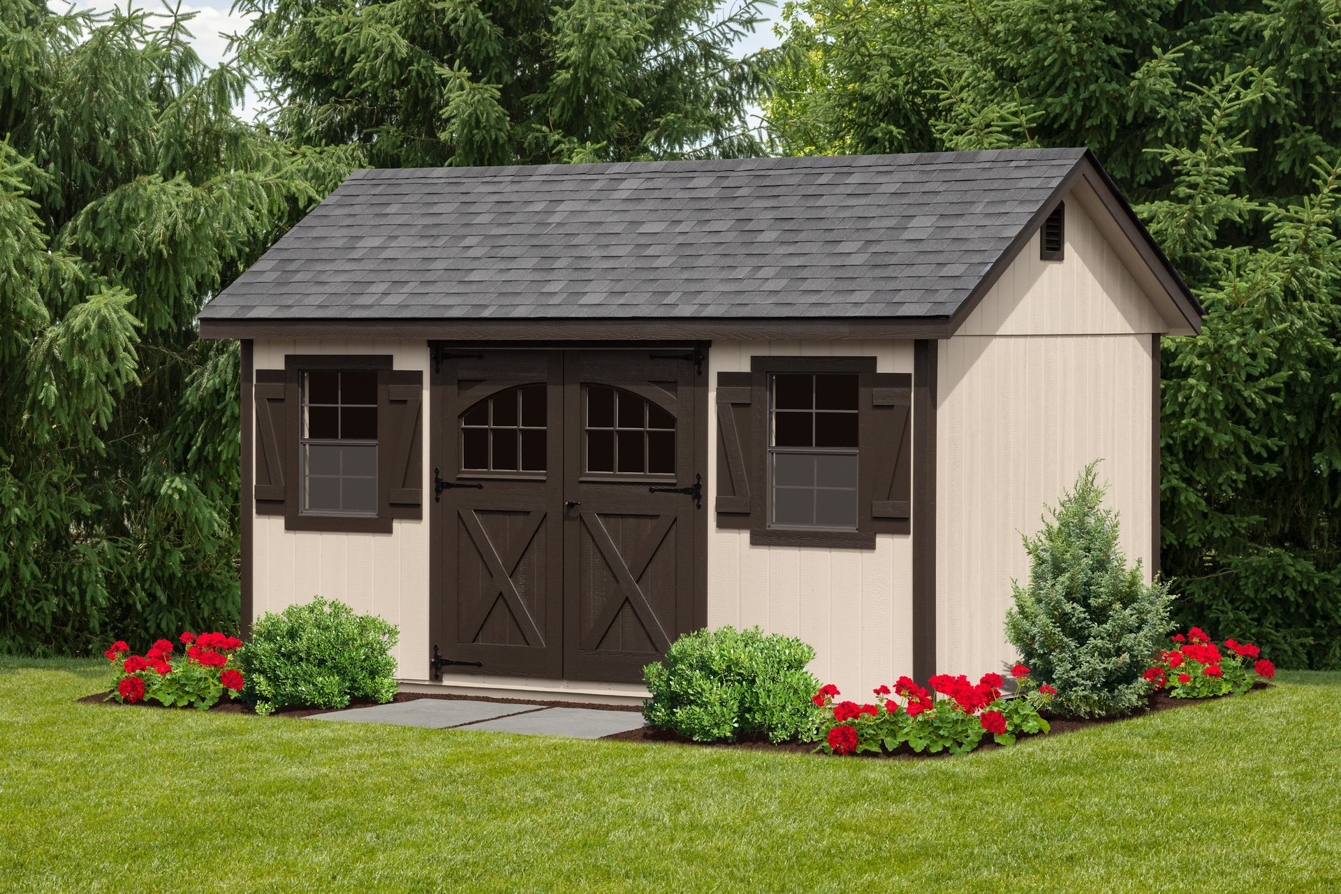 Tan shed with brown doors, shutters, and roof against a green yard with bushes and trees.