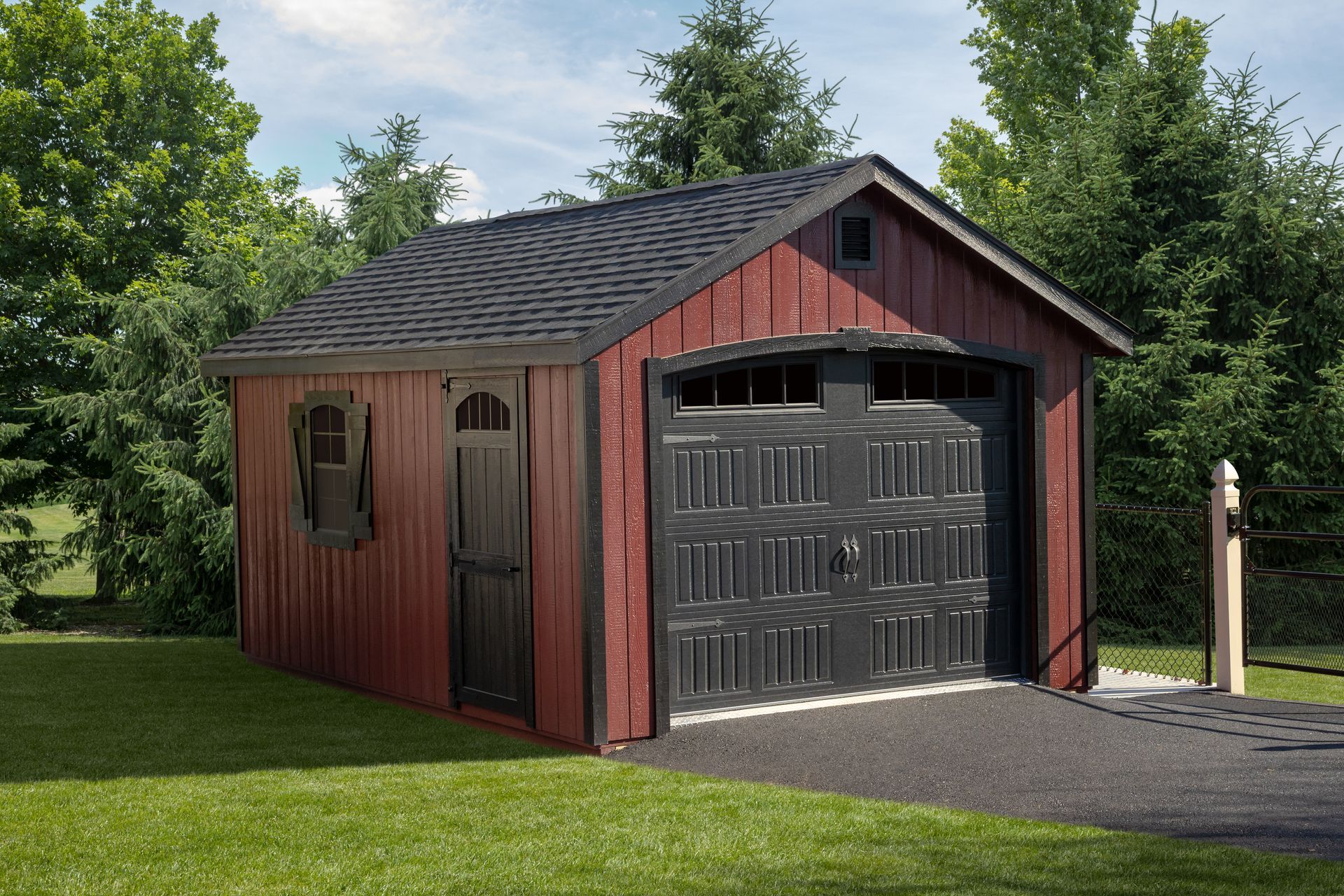 Red and black wooden garage with asphalt driveway and green lawn.