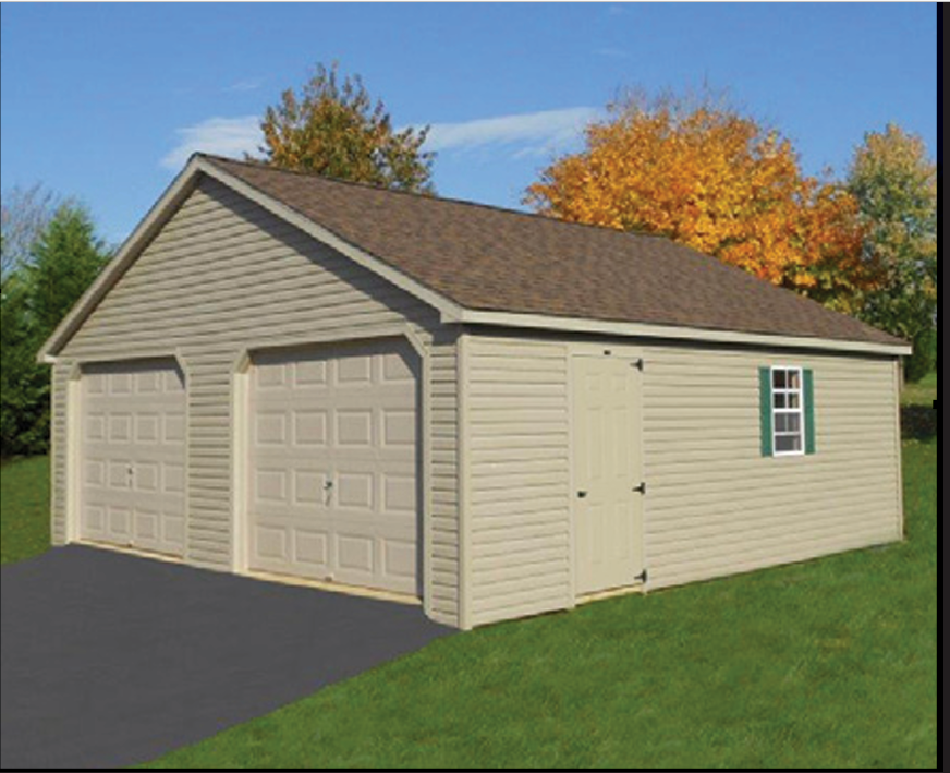 Tan two-car garage with brown roof and green-trimmed window.  Standing on a green lawn with trees in the background.