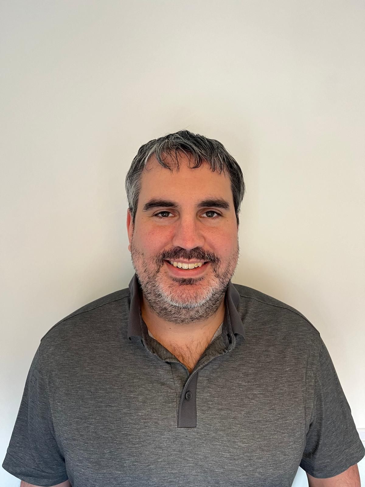 Headshot of Justin D. Erman